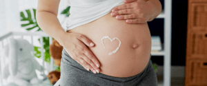 How can you reduce stretch marks during pregnancy