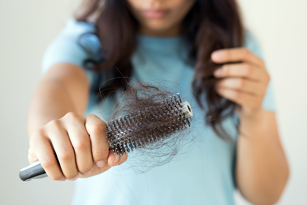 What causes pregnancy hair loss